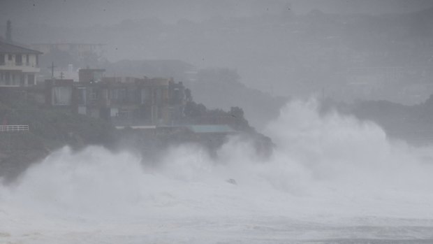 Huge waves whipped up by the storm smash into Lurline Bay, Sydney. 