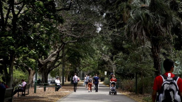 Visitors walk through the Brisbane Botanic Gardens.