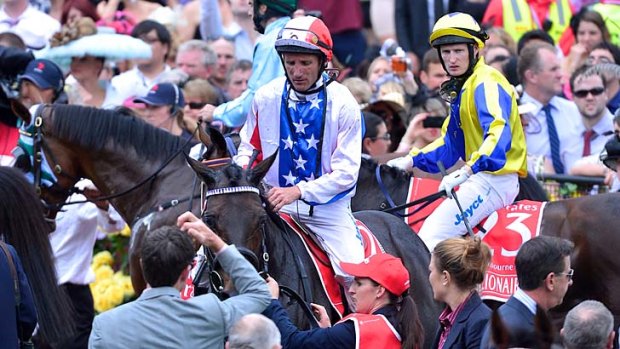 Bad day ... Damien Oliver after his controversial and unsuccessful Melbourne Cup ride on Americain.