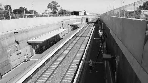 Mitcham railway station, built in a trench to remove a railway crossing in 2014, is isolated and disconnected from the local shopping centre, according to the Melbourne University-RMIT report. 