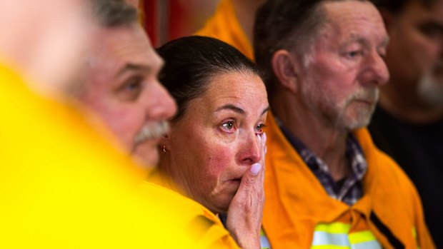 Sassafras/Ferny Creek CFA member Sarah Krumins breaks down during a press conference.