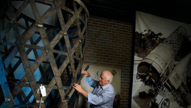 Campbell Johns, one of the volunteers at the Museum Victoria storeroom in Coburg, works on the restoration of the Great Melbourne Telescope.