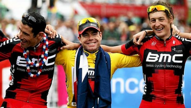 Labor MP Bernie Ripoll watched sections of the 2011 Tour de France, won by Australian Cadel Evans (centre).