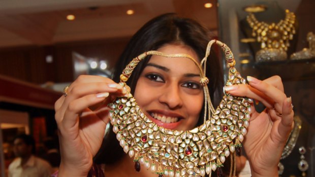 A traditional bride requires several pieces of jewellery, including an elaborate necklace, earrings, and bangles.  Some families spend $A15,000 for each item.  The dress can cost about up to $A25,000.