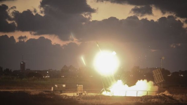 The Iron Dome air-defense system fires to intercept a rocket in Israel.