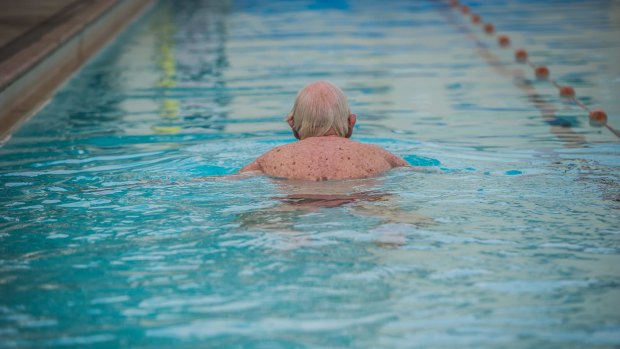 94 year old Mervyn (Merv) Knowles does his daily laps of The Manuka Public swimming pool, where he has swum since its opening in 1931.