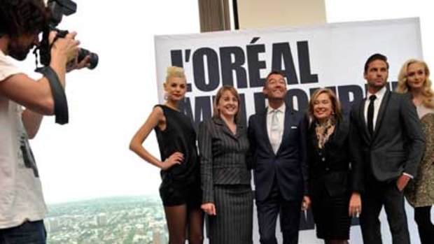 Grant Pearce (third from left) poses at the launch of 2011 L'Oreal Melbourne Fashion Festival on Thursday, Nov 18. Photo: Pat Scala/The Age