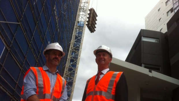 Master Builders Qld's Paul Bidwell with Housing Minister Tim Mander at Kelvin Grove.