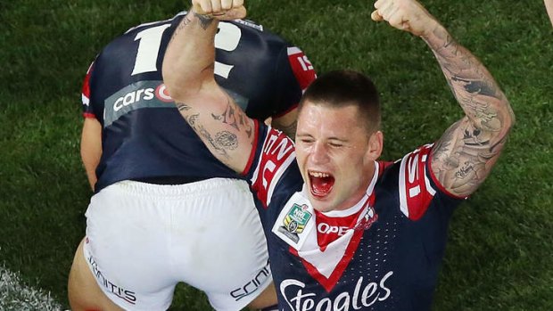 No pain, no gain: Shaun Kenny-Dowall celebrates after playing 65 minutes with a broken jaw.