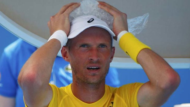 Anguish: Nikolay Davydenko feels the pressure in his match against Richard Gasquet.