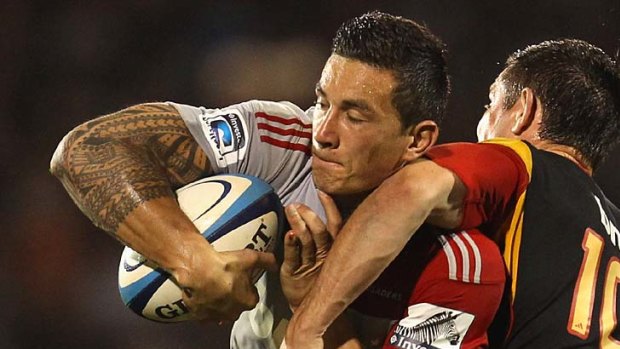 Sonny Bill Williams of the Crusaders looks to offload the ball against the Chiefs.