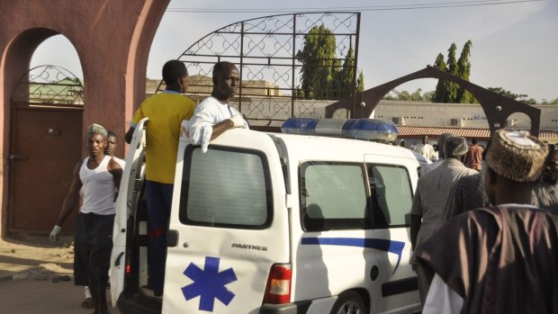 An ambulance enters the premises of the Kano Central Mosque after a gunmen set off three bombs. 