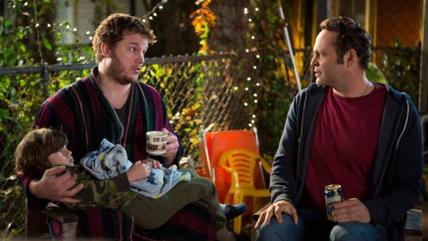 Affable underachiever David Wozniak (Vince Vaughn, right) seeks advice from his friend and attorney Brett (Chris Pratt) when he discovers that his anonymous donations to a fertility clinic 20 years earlier resulted in 533 children in <i>Delivery Man</i>.