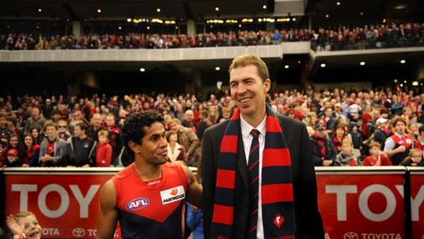 Aaron Davey with Jim Stynes after a win over Essendon this year at the MCG. Stynes' son Tiernan is in very left.