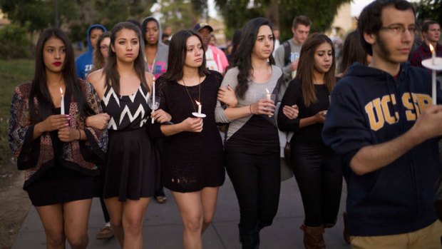 Students hold a vigil on the campus of the University of California, Santa Barbara.