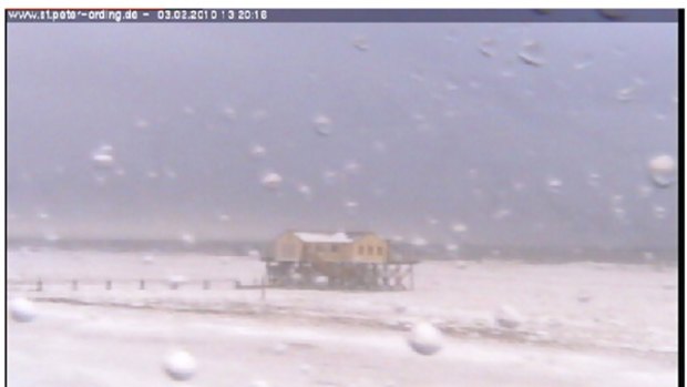 A screen grab from a webcam showing the beach of  St. Peter-Ording in Germany.