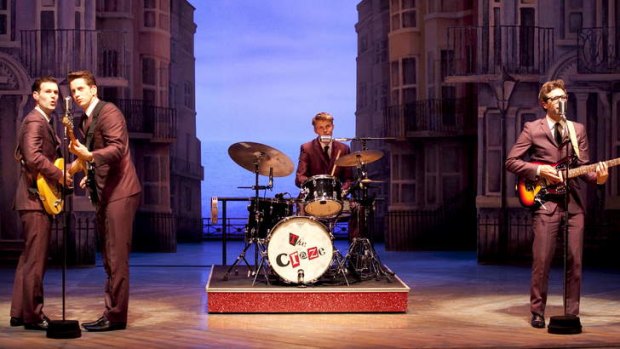 With the band: Musical comedy meets variety show in the Melbourne Theatre Company's presentation of the London hit <i>One Man, Two Guvnors</i>.