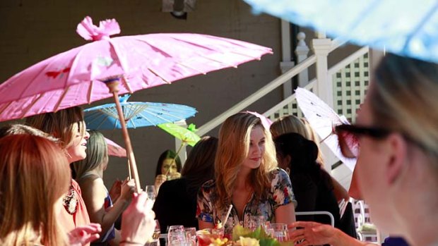 Sup in the sun ... parasols and retro frills pack the terrace at Madame Brussels, where cupcakes and other old-fashioned treats reign.