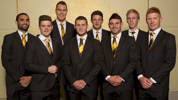 Eight is great: Hawthorn has re-signed (from left) Shaun Burgoyne, Taylor Duryea, Max Bailey, Mitch Hallahan, Angus Litherland, Brent Guerra, Will Langford and Kyle Cheney.