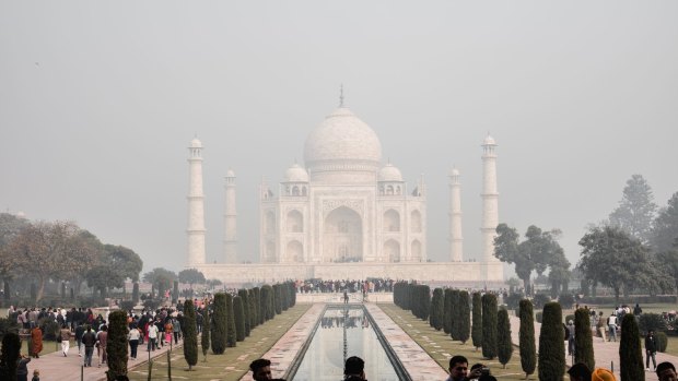 More than 30,000 people visit the Taj Mahal each day.