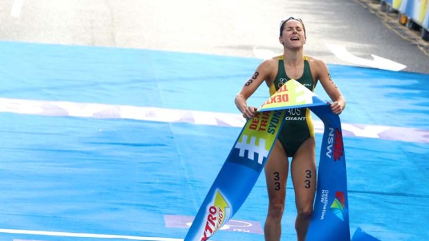 Boilover &#8230; Erin Denshaw crosses the line to win convincingly in yesterday's Sydney Triathlon, just two years after heart surgery.