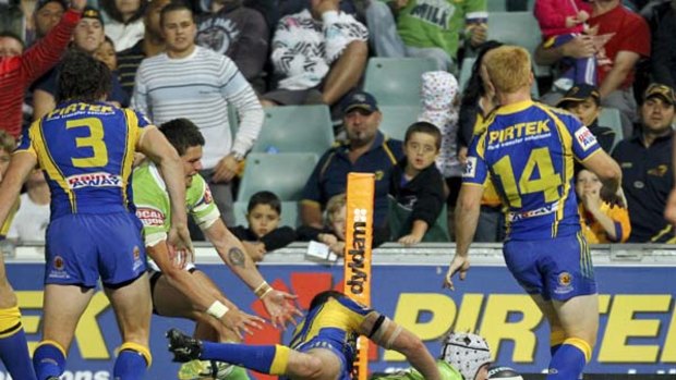So close ... Jarrod Croker is denied a second-half try by a last-ditch tackle from Ben Smith. But the Eels still sank to their fourth loss in five matches.
