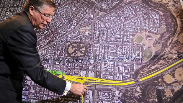 Premier Denis Napthine explains the route of the proposed east-west link.