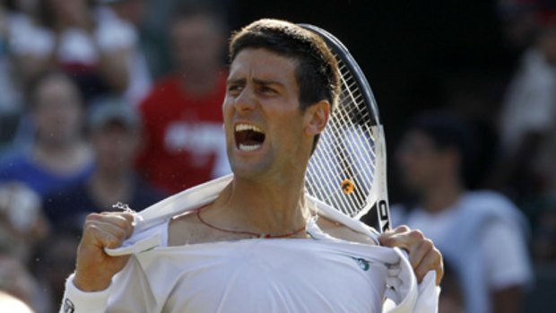 Serbia's Novak Djokovic celebrates by ripping his shirt after defeating Australia's Lleyton Hewitt at Wimbledon overnight.