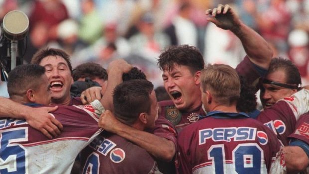Victors: Mark Carroll and Manly teammates celebrate winning in 1996.
