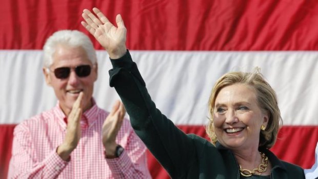 Hillary Clinton campaigns in Iowa with her husband, former president Bill Clinton.
