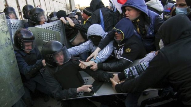 "Disorder": Pro-Russia protesters scuffle with police.