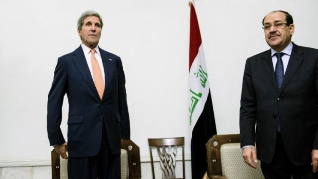 US Secretary of State John Kerry with Iraqi Prime Minister Nouri al-Maliki in Baghdad.