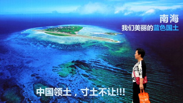 A billboard with words that read: "South China Sea, our beautiful motherland, we won't let go an inch" in east China's Shandong province. 