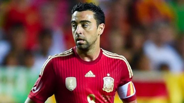 Over and out: Xavi Hernandez will no longer play for Spain but will see out his contract at Barcelona.