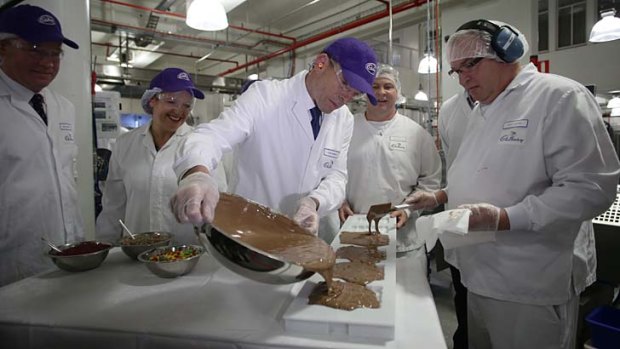 'During the election campaign, Abbott flew to Tasmania and blithely handed a gift of $16 million to the Cadbury chocolate factory'.