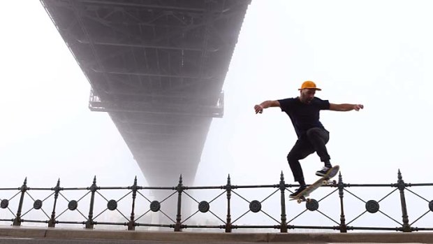 Skateboarder Paul Brabenec beneath the Harbour Bridge.