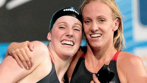 Missy Franklin with teammate Dana Vollmer after the winning the 4x100m medley relay.