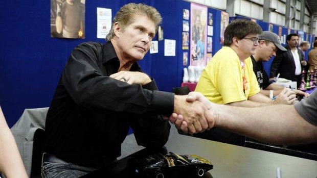 David Hasselhoff signs and shakes for his many fans.