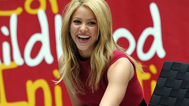 Shakira ... charity with a smile.