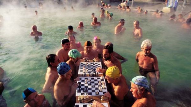 Your move ... chess players in the famous Szechenyi baths at Pest.