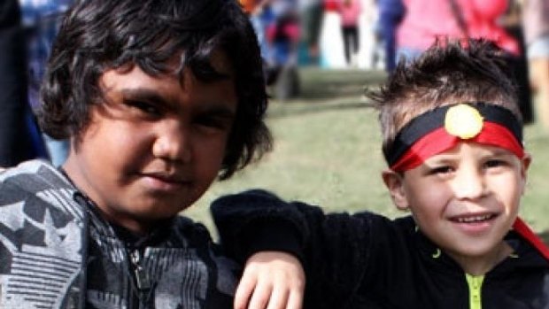 Two children enjoy themselves during the 2013 Musgrave Park Family Fun Day.