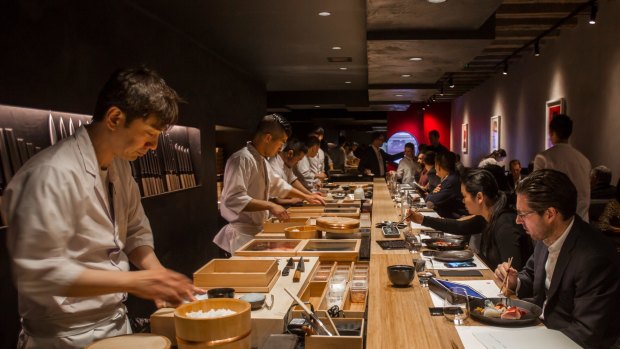 Chefs at Kisumé’s sushi bar face the diners.