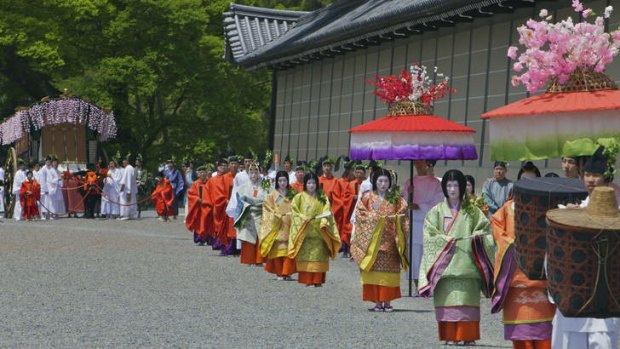 The Aoi Matsuri parade at Kyoto Imperial Palace in Japan.