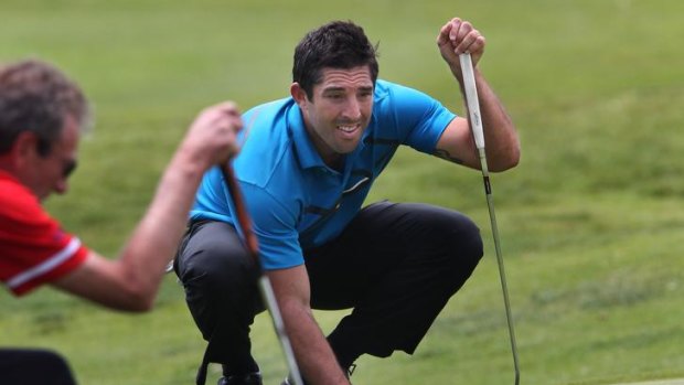 New challenge ... Braith Anasta checks his putting line.