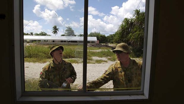 Engineers from the Australian Defence Force inspect one of the old processing centres in Nauru.