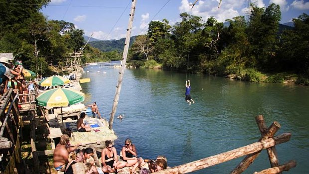 Alcohol and large bodies of water should not mix ... a bar on the riverbank at Vang Vieng.