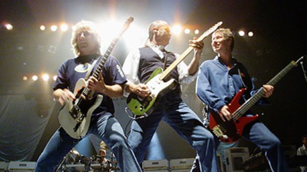 Honours for Quo duo Rick Parfitt and Francis Rossi, left and centre.