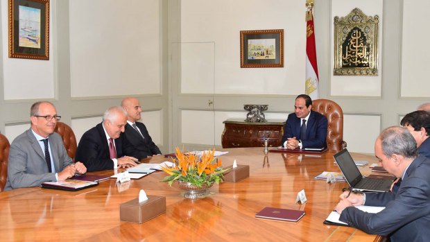 Eni CEO Claudio Descalzi, third left, and his delegation meet with Egyptian President Abdel-Fattah el-Sissi, centre, and an Egyptian delegation, in Cairo, Egypt. The Italian energy company announced it has discovered a 'supergiant' natural gas field off the Egyptian coast.