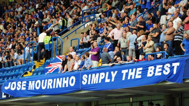 Simply the best: Fans share the love with Chelsea's Portuguese manager Jose Mourinho at the match between Chelsea and Hull City at Stamford Bridge in London on Sunday.