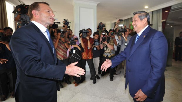 Indonesian President Susilo Bambang Yudhoyono, right, welcomes then Australian opposition leader Tony Abbot prior to their meeting in Jakarta on October 15, 2012.